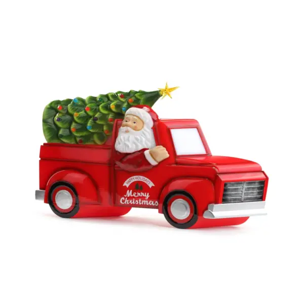 Mr. Christmas Outdoor LED Christmas Decoration Santa in Christmas Tree Truck - 21"