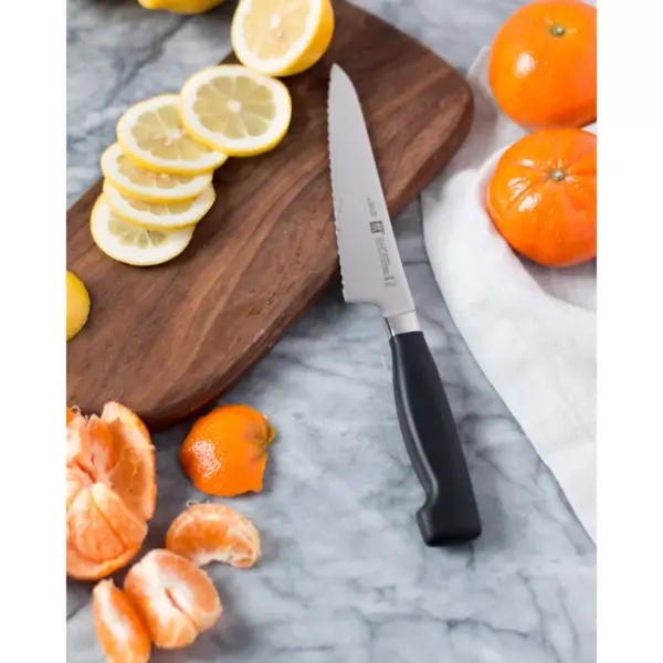 ZWILLING Four Star 5.5-inch Serrated Prep Knife