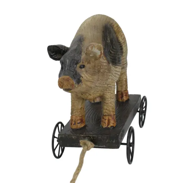 Northlight 10" Black and White Wood Textured Pig on Cart Outdoor Garden Statue